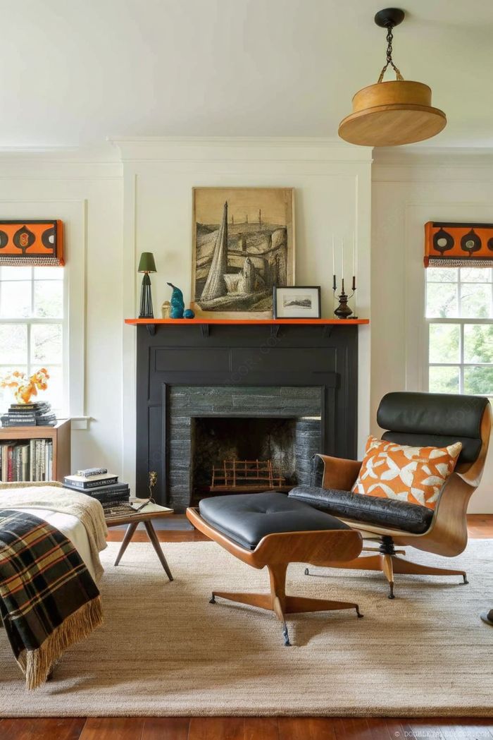 Stylisches Wohnzimmer mit schwarzem Kamin, orangem Regal, Deko-Art und gemütlicher Leseecke mit viel Tageslicht.